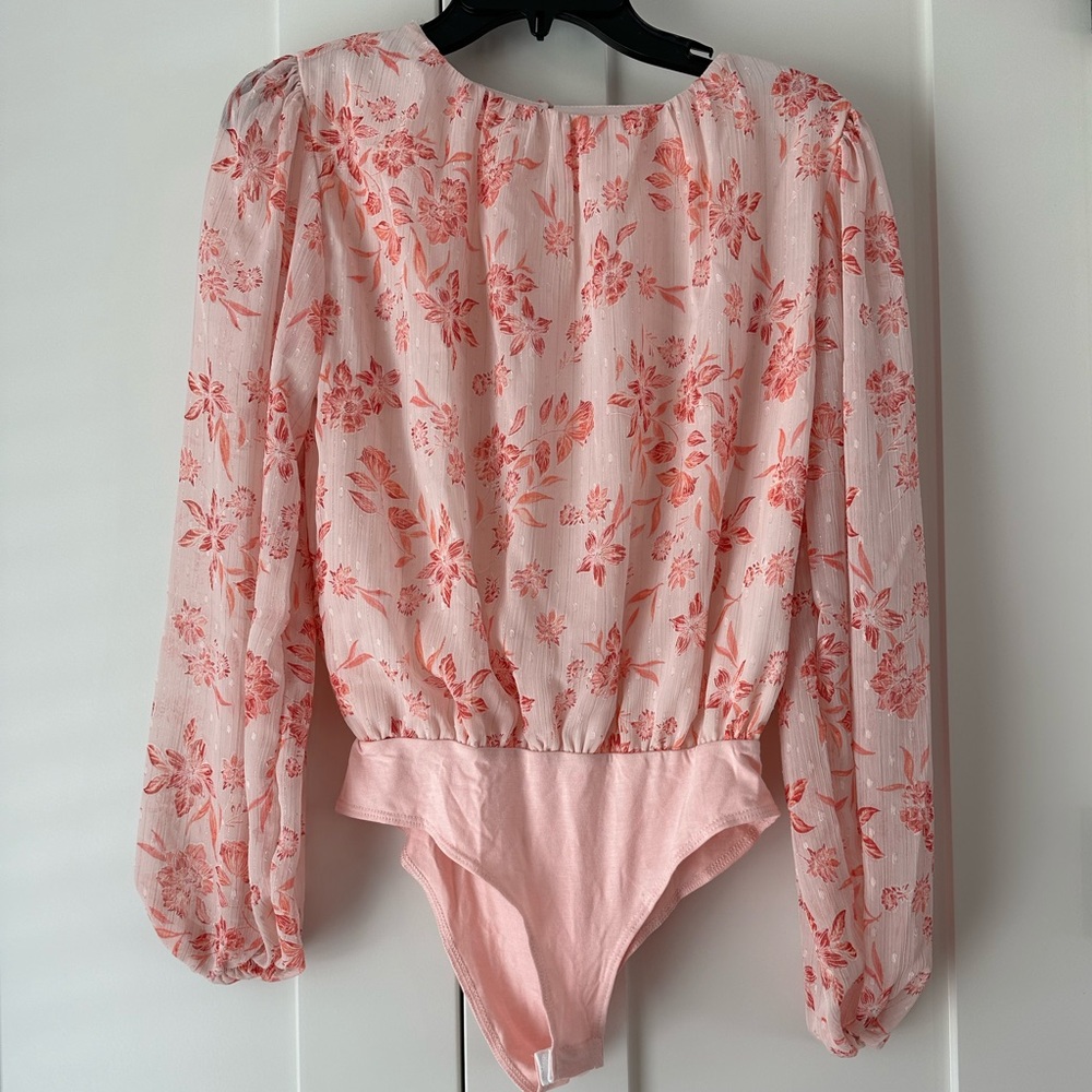 Pink Lily Bubble Sleeve body suit. S